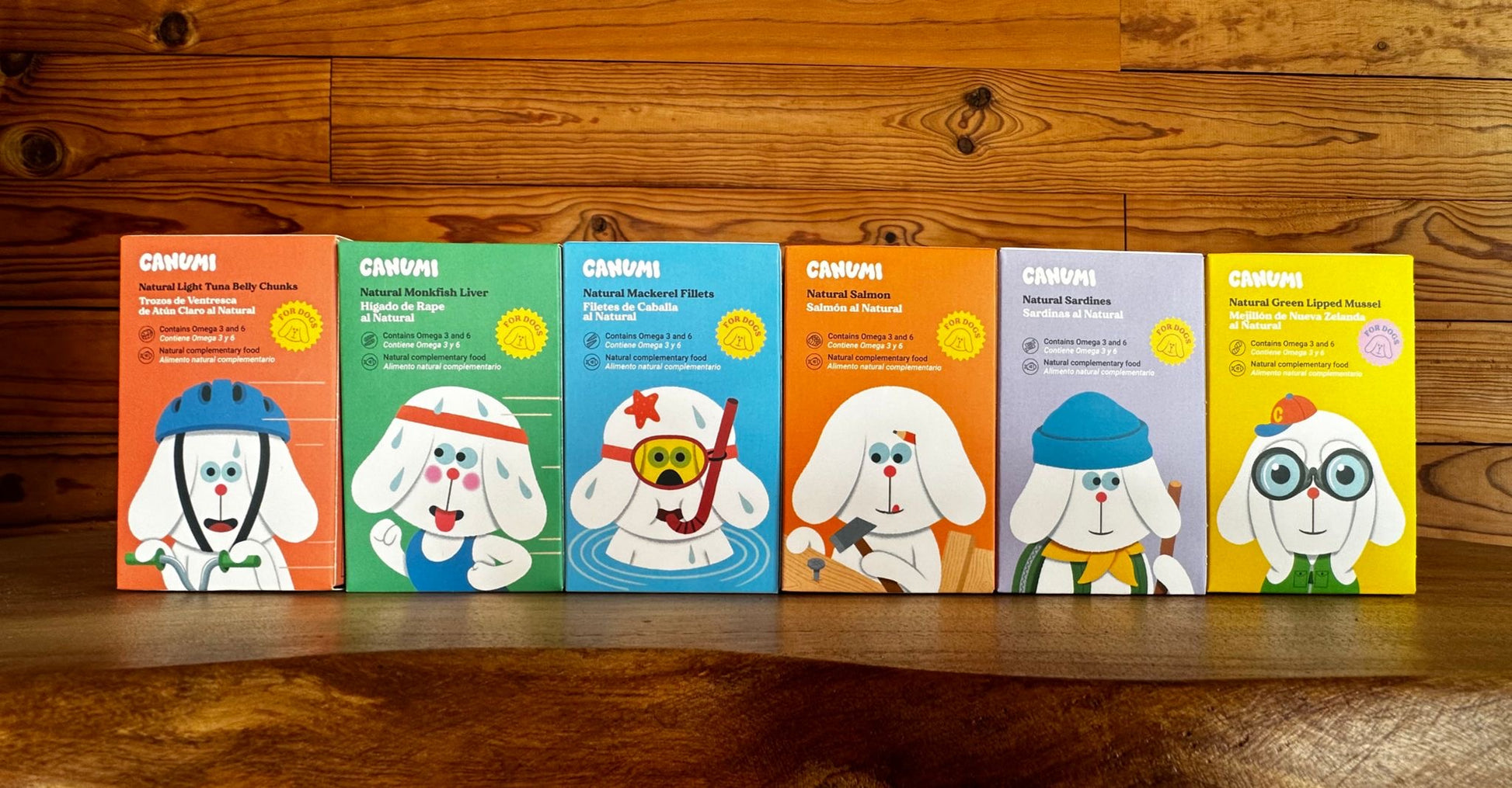 All six Canumi seafood topper flavours lined up in their colourful boxes